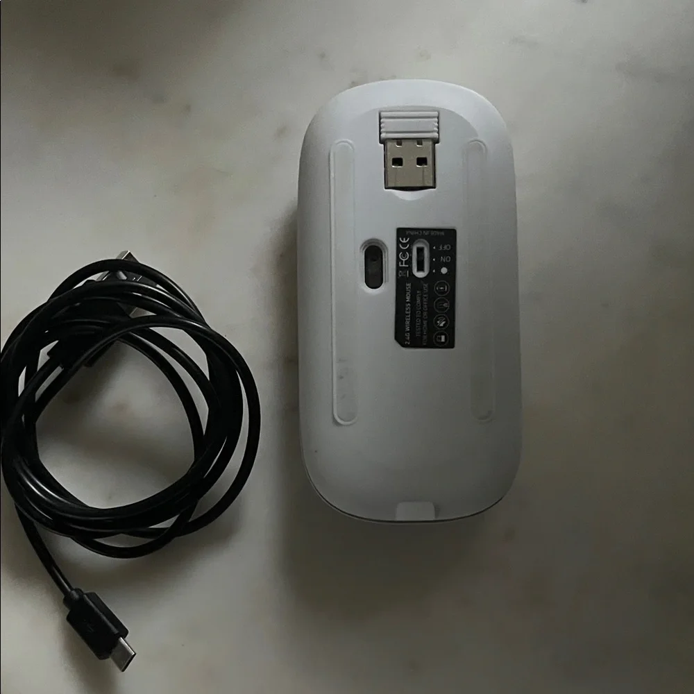 Growing bundle of chargers, cables, power bank and wireless mouse